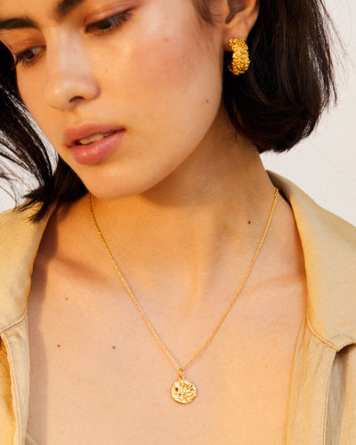 Model wearing Alighieri Sagittarius zodiac Medallion necklace