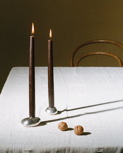 The Floating Pebble Candlesticks with Candles